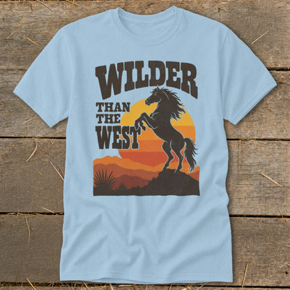 Light blue t-shirt with "WILDER THAN THE WEST" text and rearing horse graphic.