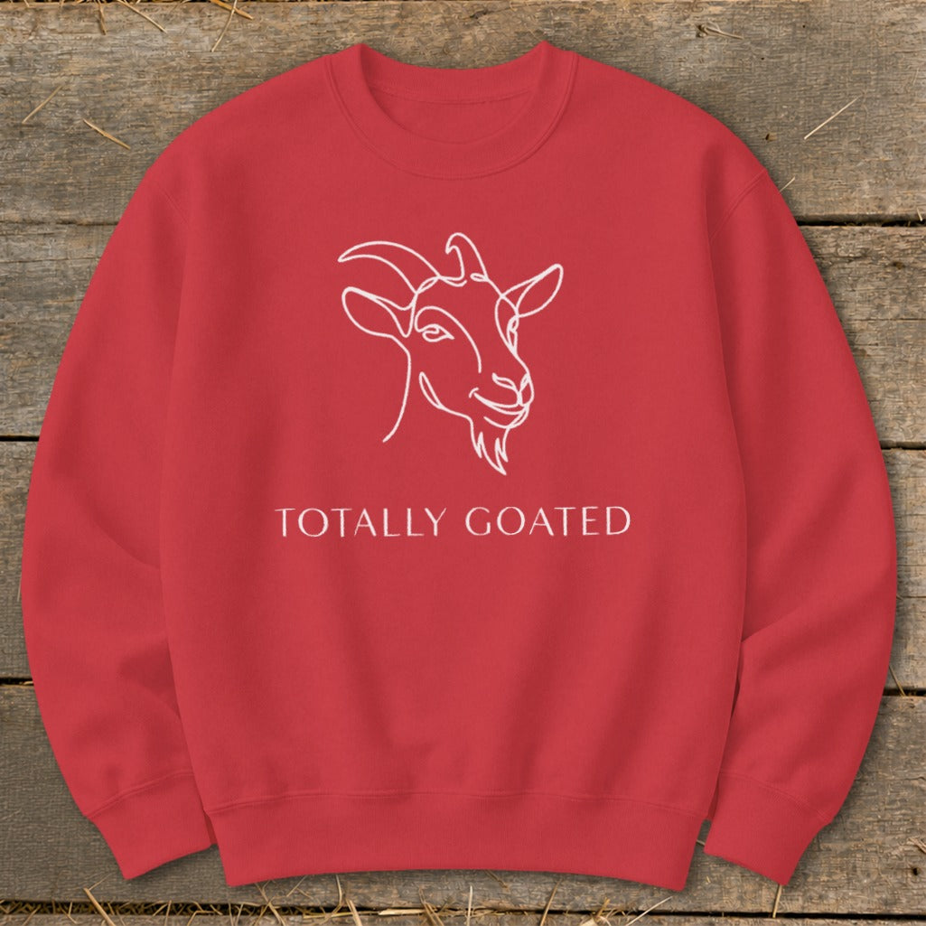 Red sweatshirt with white line drawing of a goat and text "TOTALLY GOATED".