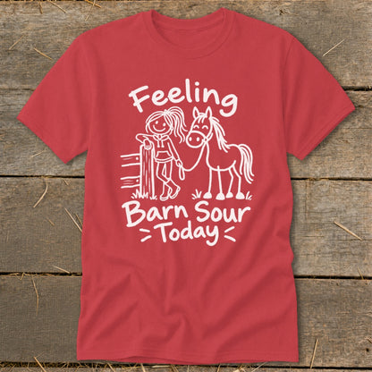 Red t-shirt with white line drawing of girl and horse, text "Feeling Barn Sour Today".