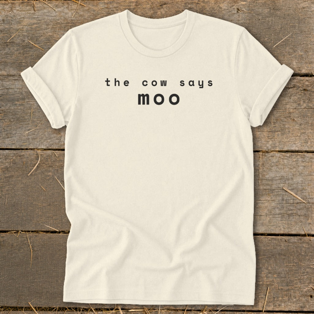 Cream t-shirt with black text that reads "the cow says moo".