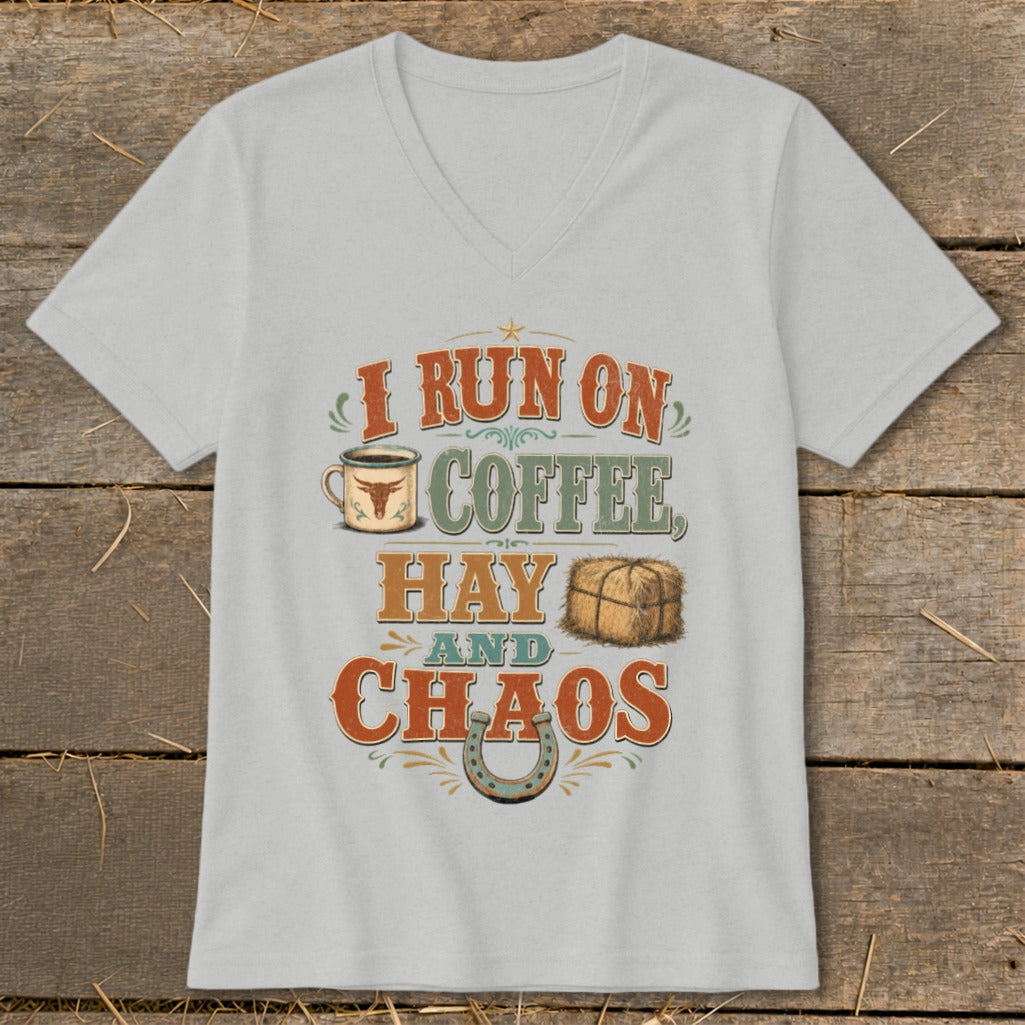 Light gray v-neck t-shirt with "I RUN ON COFFEE, HAY AND CHAOS" text and graphics.