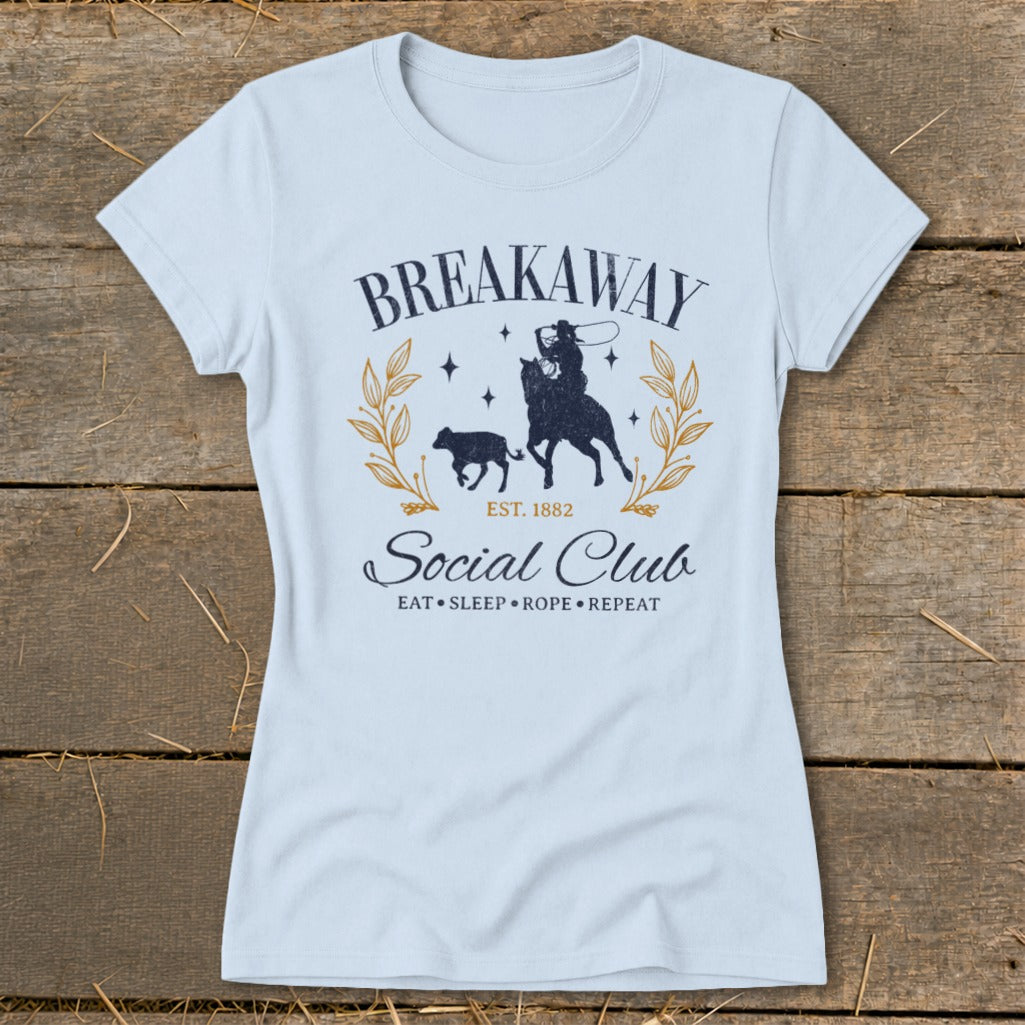Light blue t-shirt with "Breakaway Social Club" and a rodeo scene.