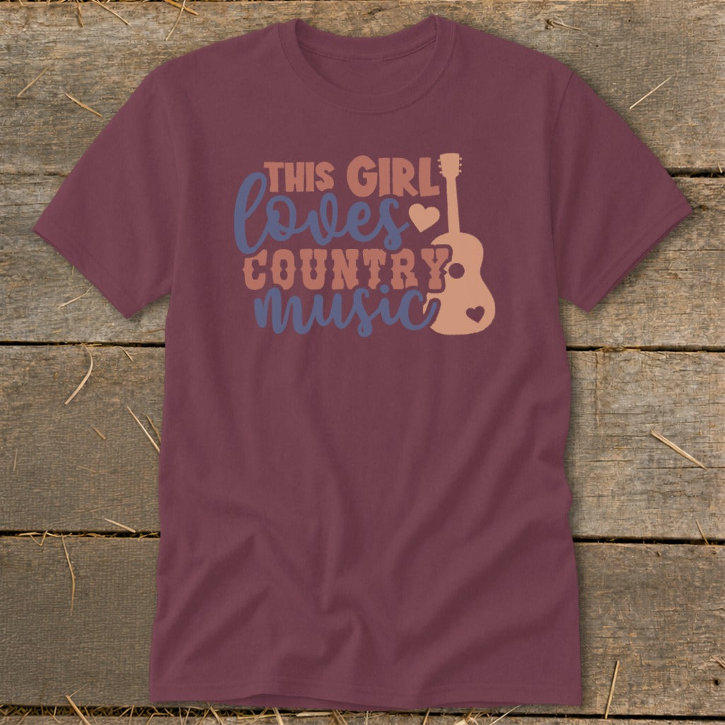 Burgundy t-shirt with "This Girl Loves Country Music" graphic and guitar silhouette.