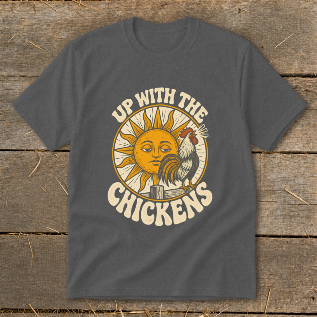 Dark gray crewneck t-shirt featuring a retro sun and rooster graphic with text that reads Up With The Chickens.