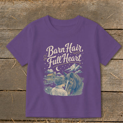 Purple t-shirt with text "Barn Hair, Full Heart" and illustration of a girl and horse.