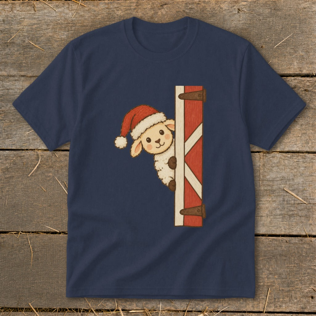 Navy t-shirt with a cartoon sheep wearing a Santa hat peeking from behind a barn door.