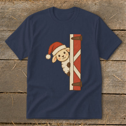 Navy t-shirt with a cartoon sheep wearing a Santa hat peeking from behind a barn door.
