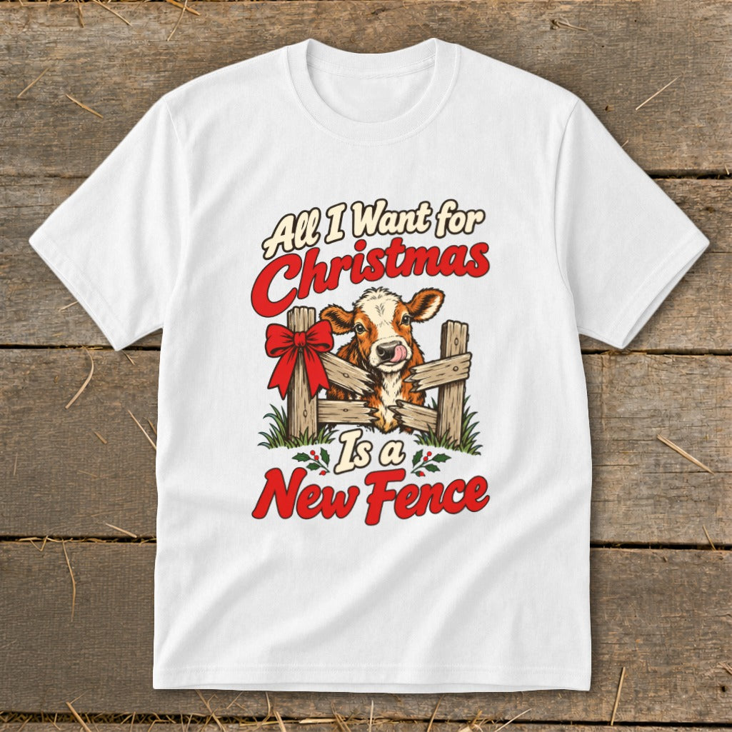 White t-shirt with a cow behind a fence, "All I Want for Christmas Is a New Fence" text.