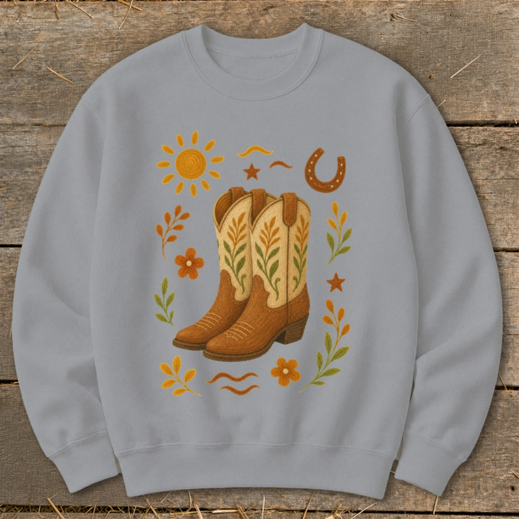 Gray sweatshirt with a Western-themed graphic of cowboy boots, sun, horseshoe, and flowers.