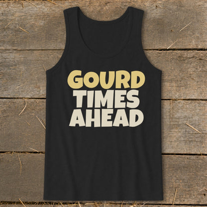 Black tank top featuring the text GOURD TIMES AHEAD in cream and yellow lettering, laid flat on a rustic wooden background.