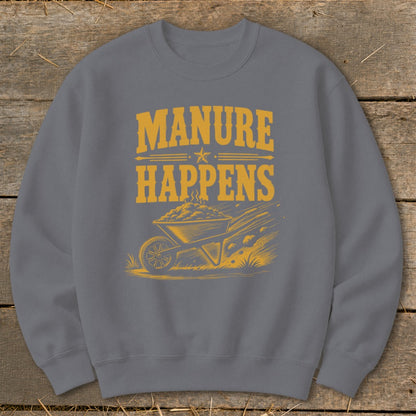 Grey sweatshirt with "MANURE HAPPENS" text and a wheelbarrow illustration.