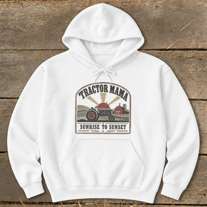 White hoodie with "Tractor Mama Sunrise to Sunset" graphic featuring a tractor and barn.