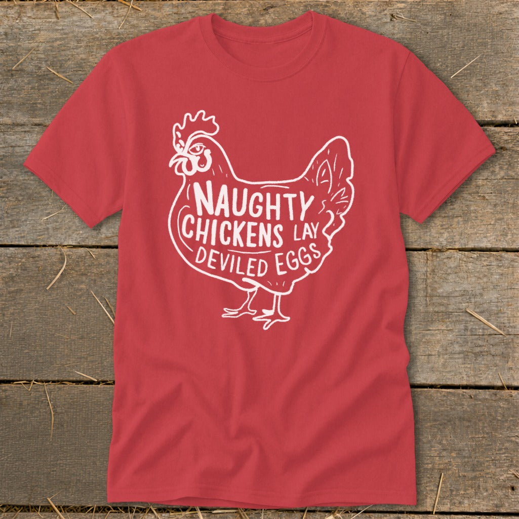 Red t-shirt with a white line drawing of a chicken and text reading "NAUGHTY CHICKENS LAY DEVILED EGGS".