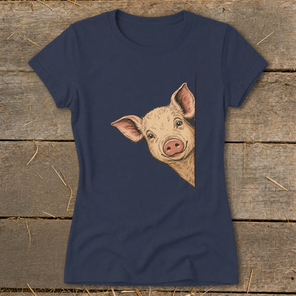 Navy t-shirt with a drawing of a smiling pig peeking from the right.