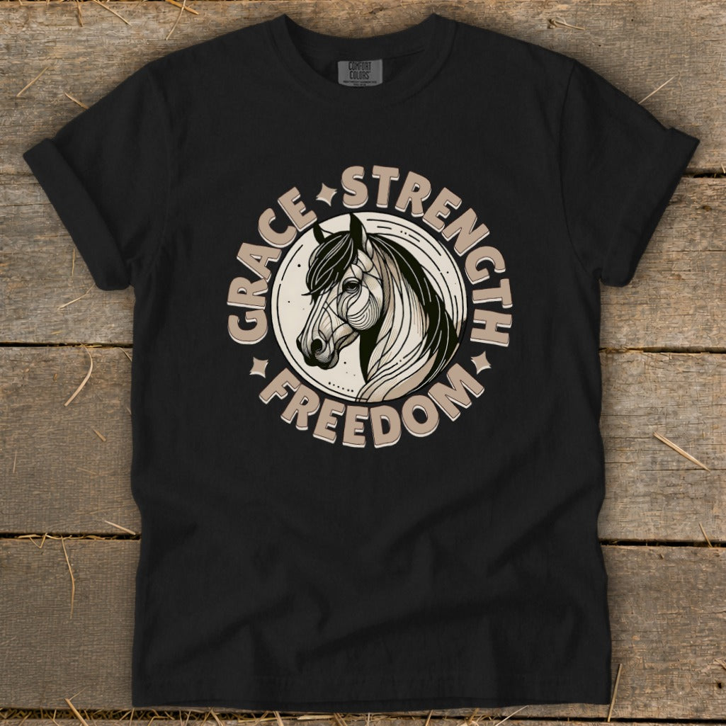 Black t-shirt with a circular graphic of a horse head and the words Grace, Strength, and Freedom.