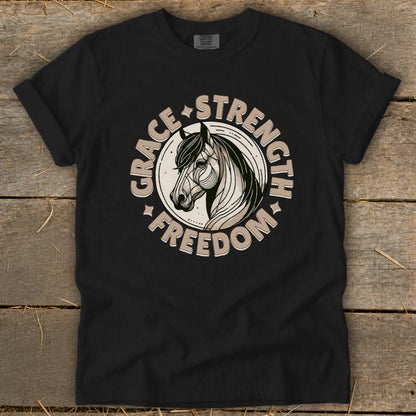 Black t-shirt with a circular graphic of a horse head and the words Grace, Strength, and Freedom.