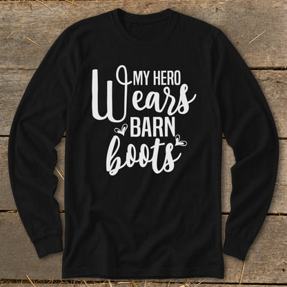 Black long sleeve shirt with white text reading "My Hero Wears Barn Boots".