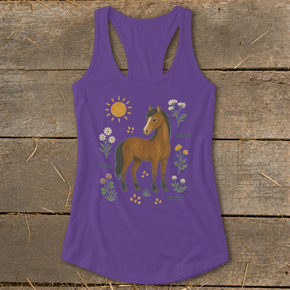 Purple tank top with a brown horse surrounded by flowers and a sun.