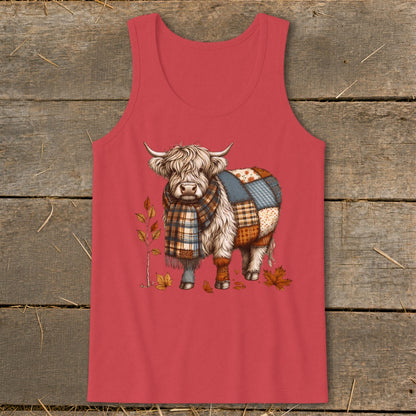 Highland cow with patched body, scarf, and autumn leaves on red tank top.