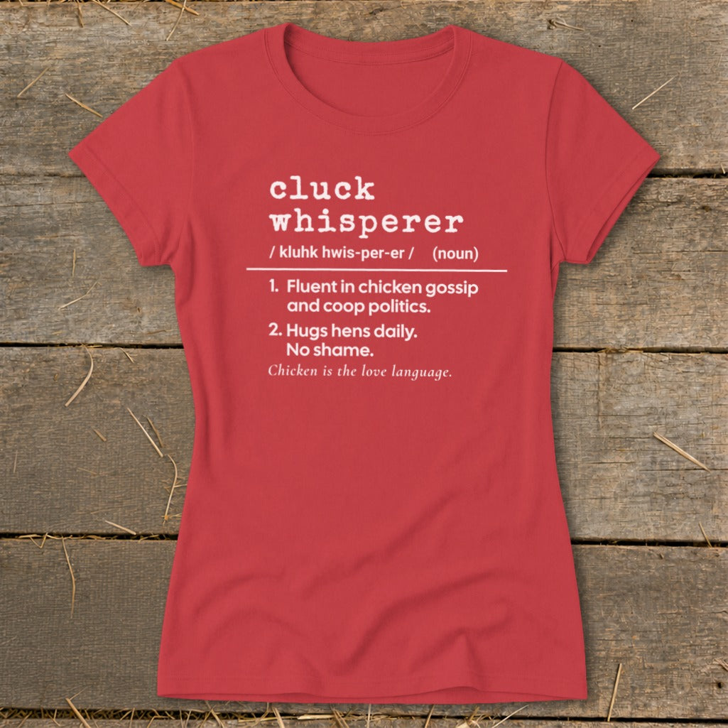 Red t-shirt with white text defining "cluck whisperer" with two numbered points.