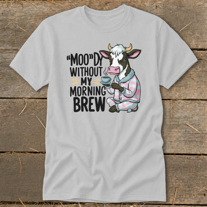 Cow in pajamas holding coffee mug with text "MOODY WITHOUT MY MORNING BREW".