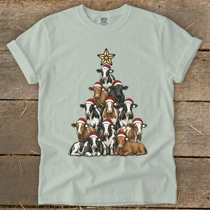 T-shirt with cows wearing Santa hats forming a Christmas tree with a star.