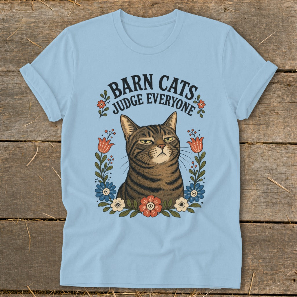 Light blue t-shirt with a judgmental cat and the text "BARN CATS JUDGE EVERYONE."