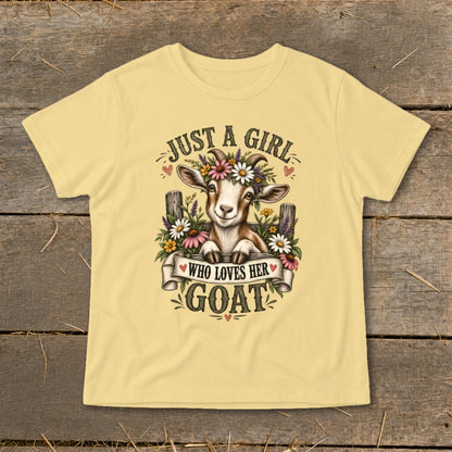 Pale yellow t-shirt with a graphic of a goat wearing flowers and the text "Just a girl who loves her goat".