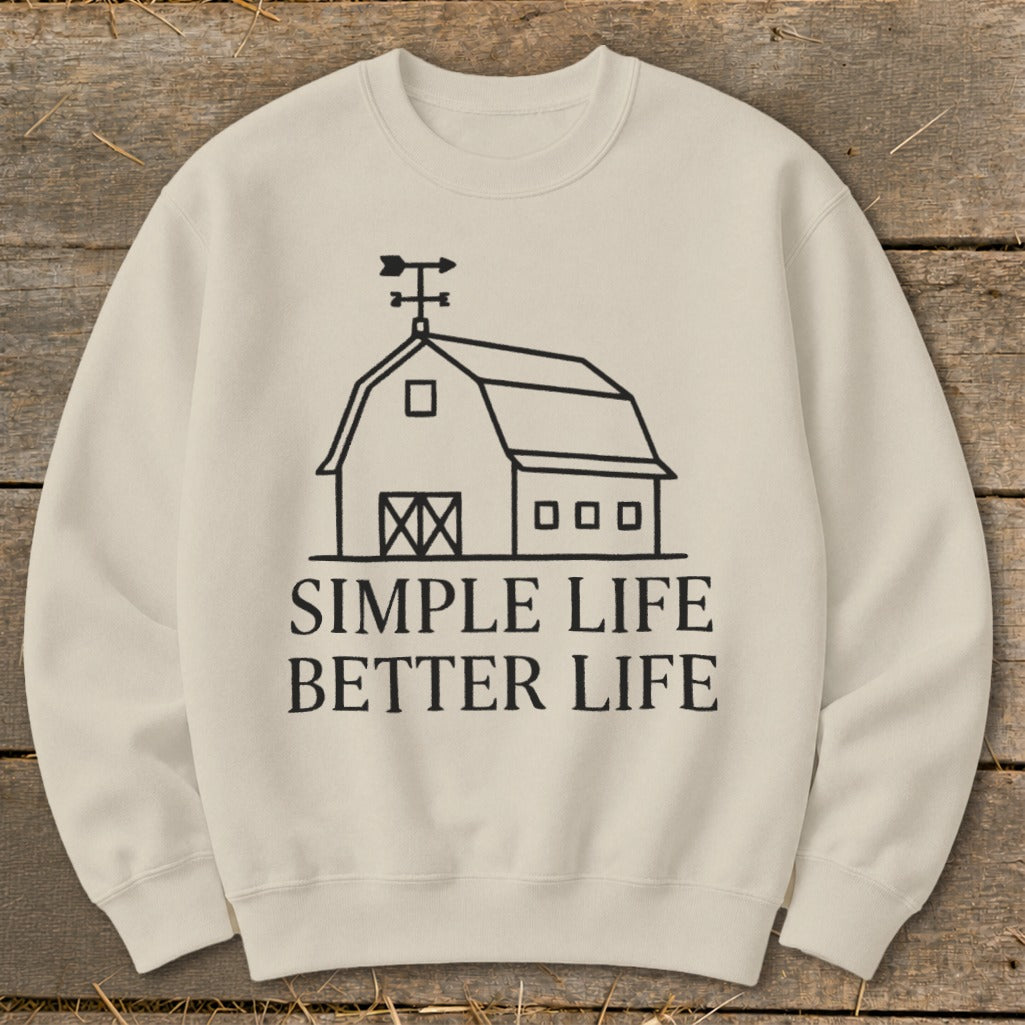 Cream sweatshirt with a black barn graphic and "Simple Life Better Life" text.