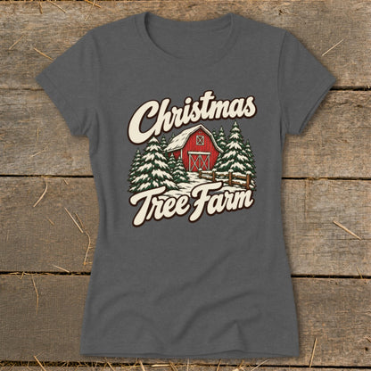 Grey t-shirt with vintage "Christmas Tree Farm" barn and pine tree graphic.