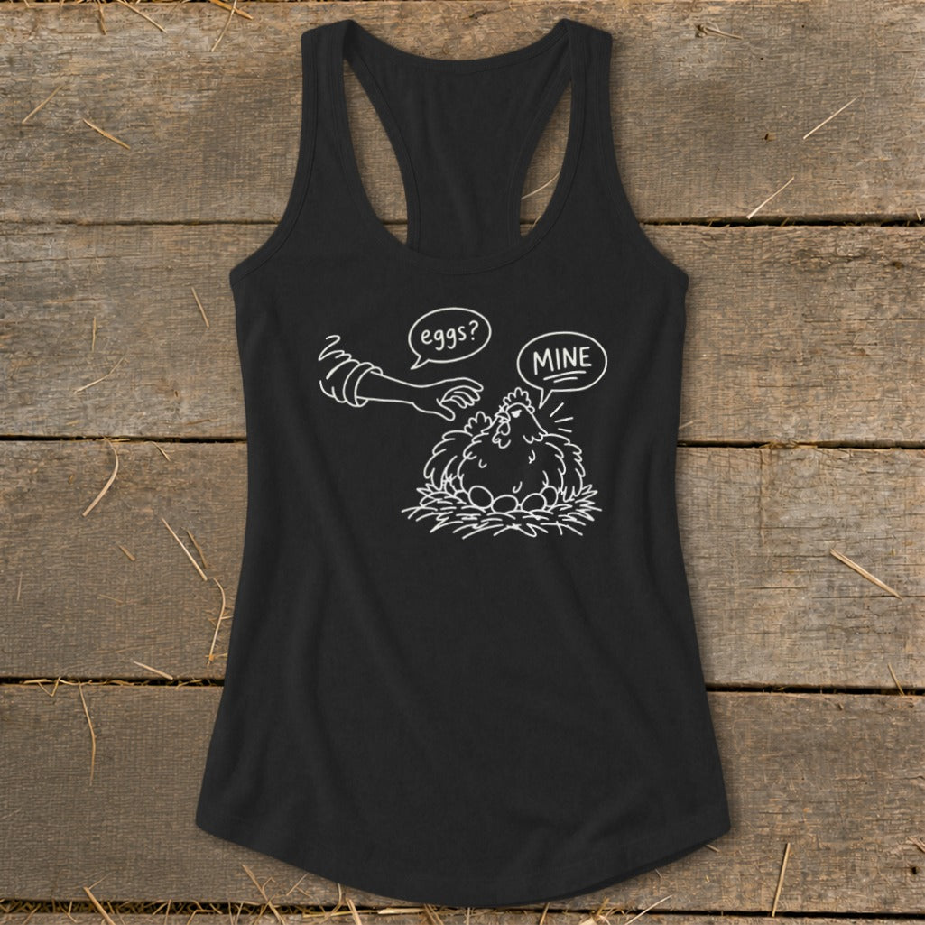 Black tank top with a drawing of a chicken guarding eggs, asking "MINE?"
