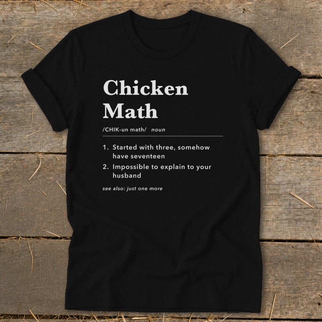 Black t-shirt with "Chicken Math" definition printed in white text.