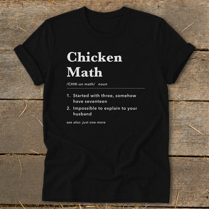 Black t-shirt with "Chicken Math" definition printed in white text.