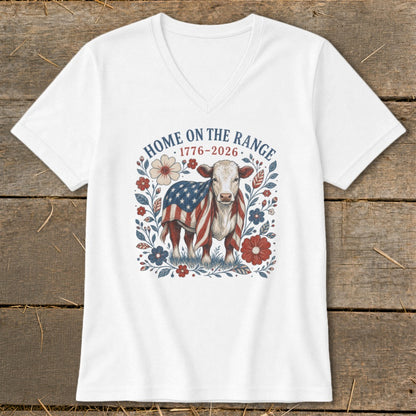White v-neck t-shirt with patriotic cow and floral design, reads "Home on the Range 1776-2026".