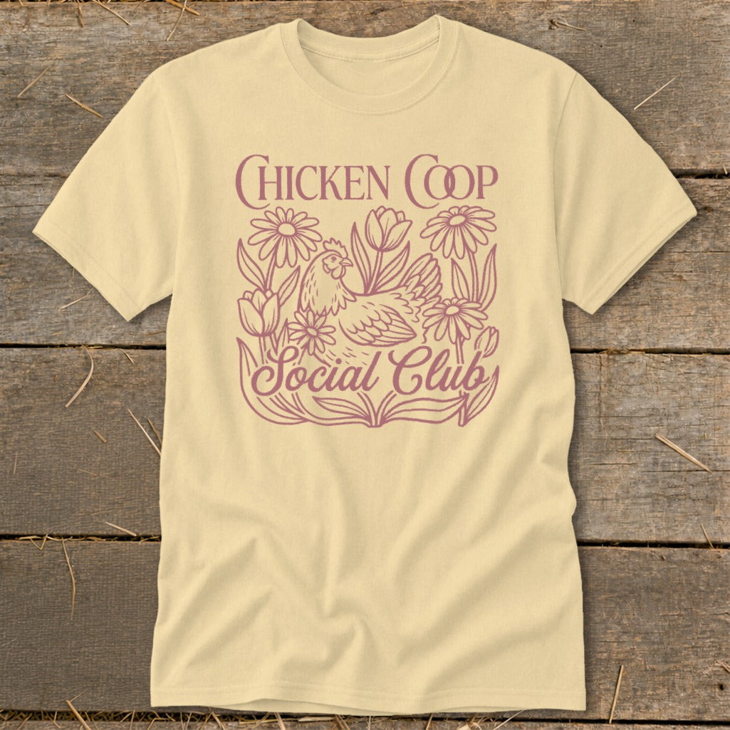T-shirt with "Chicken Coop Social Club" text and chicken in floral design.