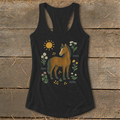 Black tank top with a brown horse, sun, and wildflowers illustration.