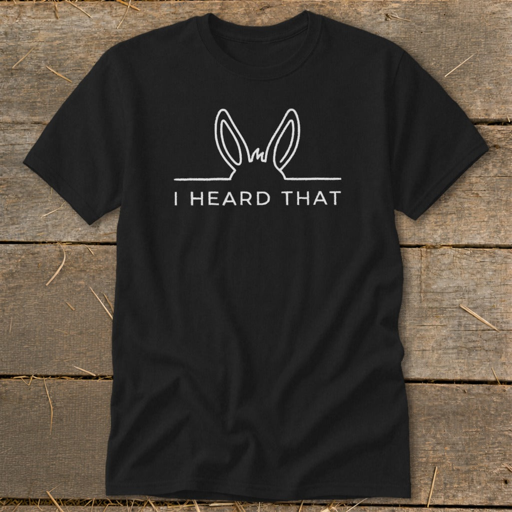 Black t-shirt with white outline of bunny ears and "I HEARD THAT" text.