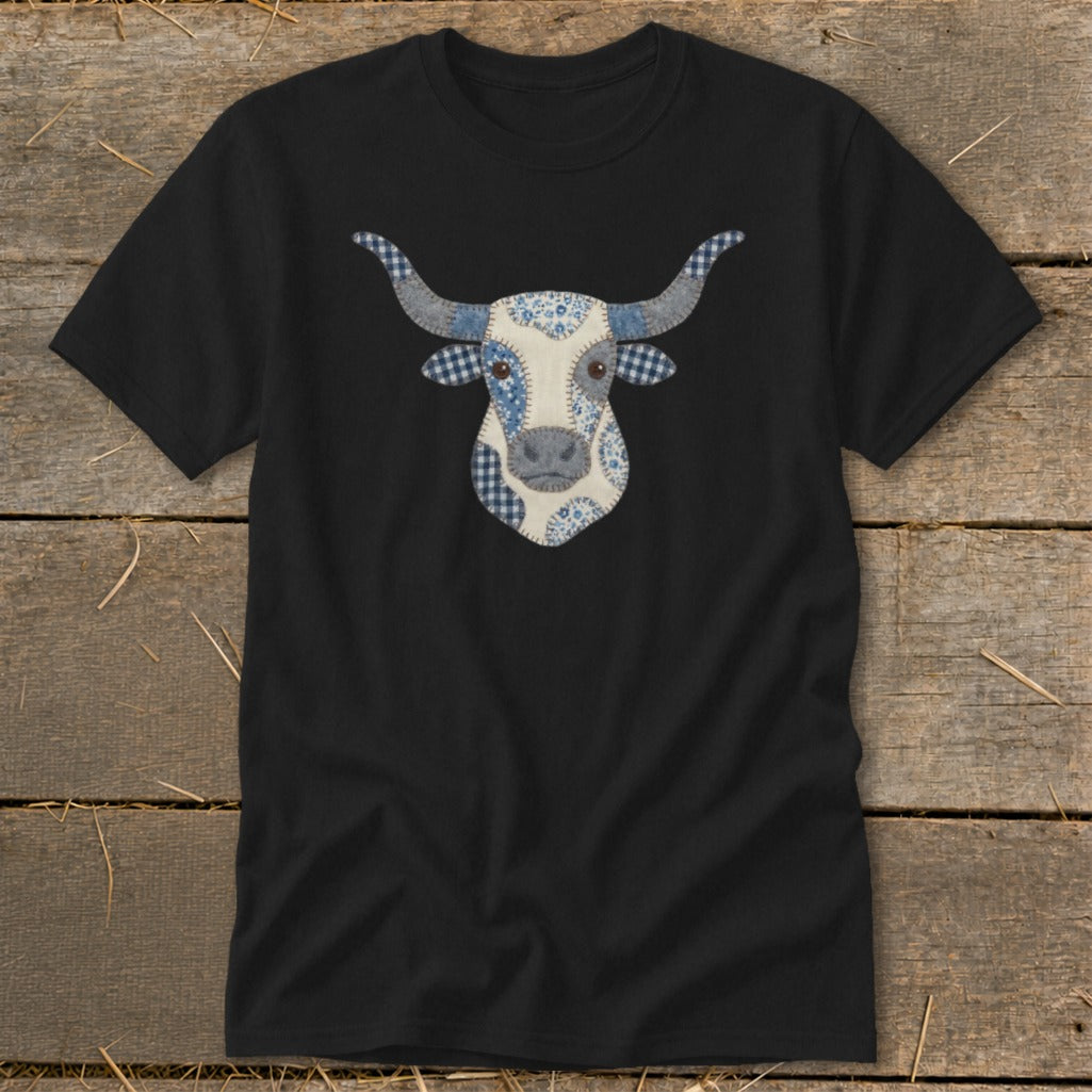 Black t-shirt with a patchwork longhorn bull head graphic.