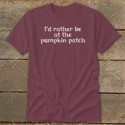 Burgundy t-shirt with white text that reads "I'd rather be at the pumpkin patch."