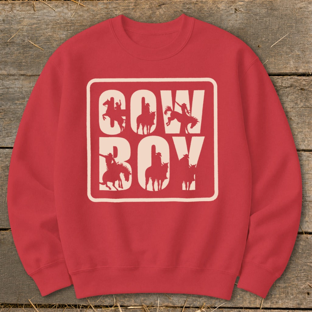 Red sweatshirt with cream "COW BOY" text and cowboy silhouettes.