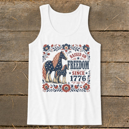 White tank top with patriotic horses and text "Raised on Freedom Since 1776."