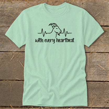 Light green t-shirt with a black graphic of a goat head in a heartbeat line and text.