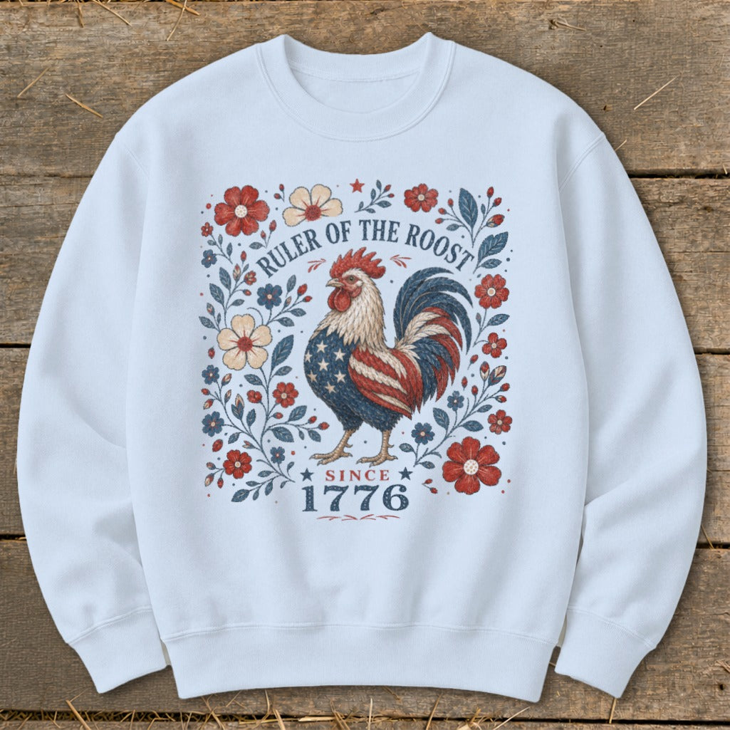 White sweatshirt with patriotic rooster graphic and text "Ruler of the Roost Since 1776".