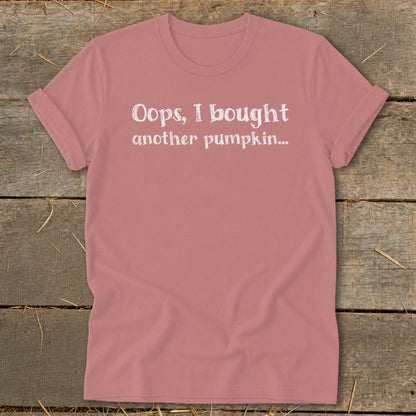Dusty rose t-shirt with white text "Oops, I bought another pumpkin..."