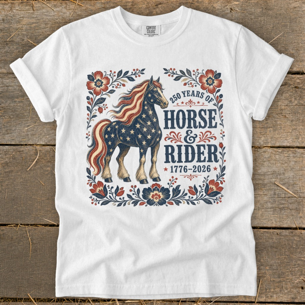 White t-shirt with patriotic horse graphic and "Horse & Rider 1776-2026" text.