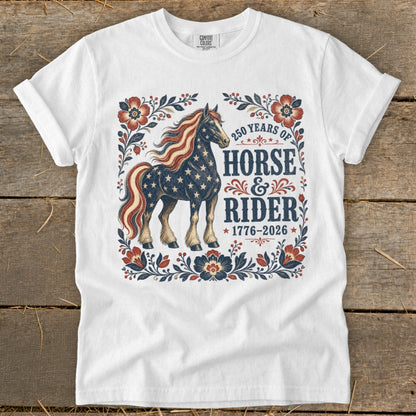 White t-shirt with patriotic horse graphic and "Horse & Rider 1776-2026" text.