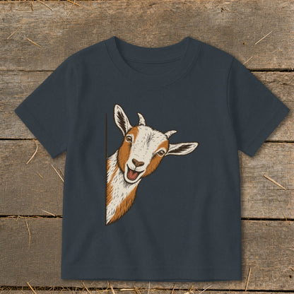 A goat peeks around the side of a navy blue t-shirt.