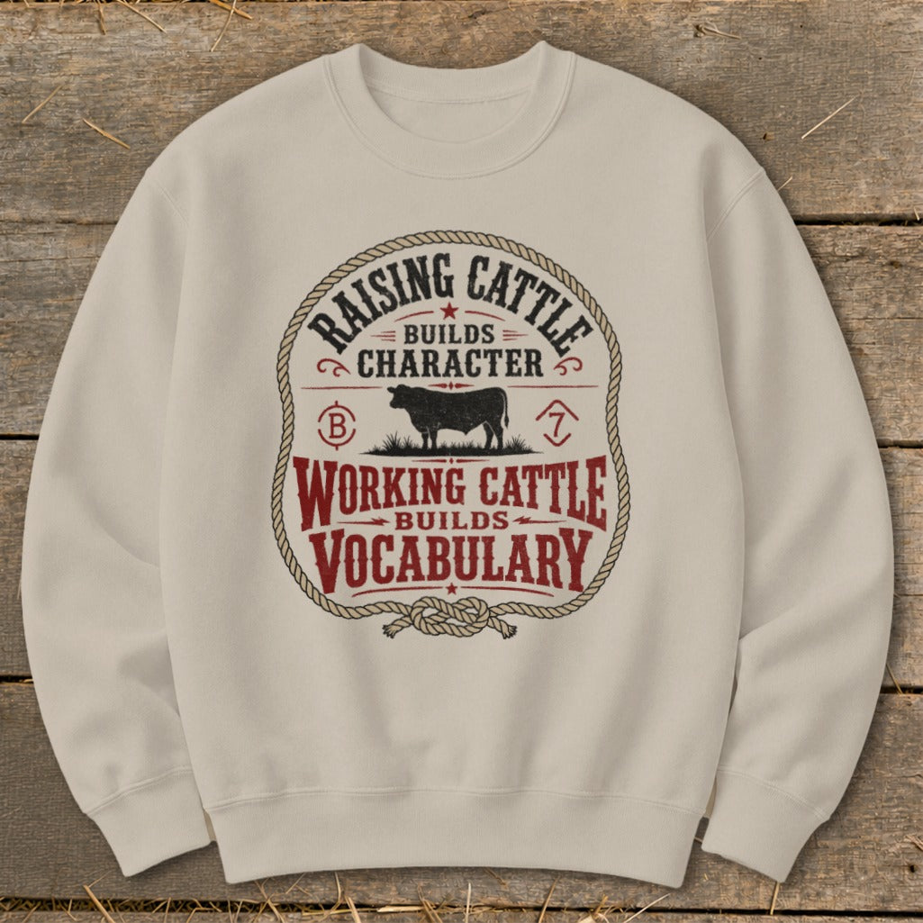 Cream sweatshirt with "Raising Cattle Builds Character, Working Cattle Builds Vocabulary" text and cow graphic.