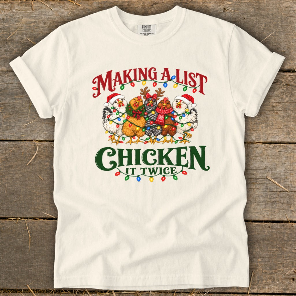Christmas t-shirt with chickens wearing Santa hats, wrapped in lights, and text.