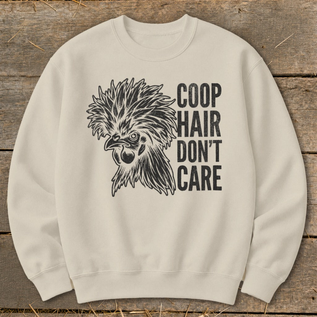 Cream sweatshirt with graphic of chicken and text "Coop Hair Don't Care."